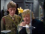 Terror Of the Autons examining a daffodil